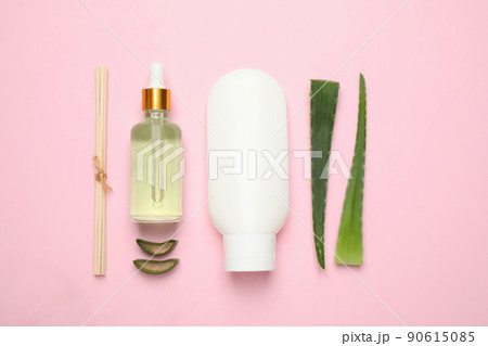 Flat lay composition with aloe vera and cosmetic products on pink background Flat lay composition with aloe vera and cosmetic products on pink background 90615085