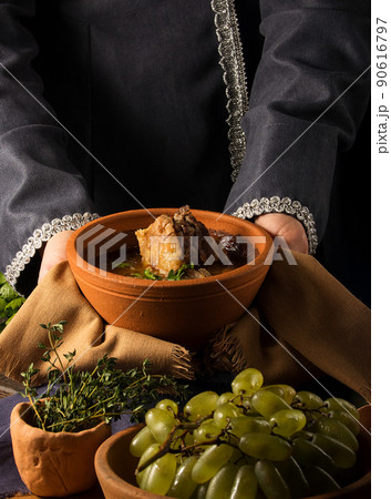 Vertical shot of a chef serving a gourmet dish Vertical shot of a chef serving a gourmet dish 90616797