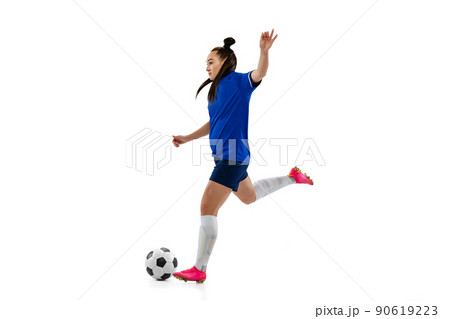 One sportive girl, female soccer, football player training isolated on white studio background. Sport, action, motion, fitness concept 90619223
