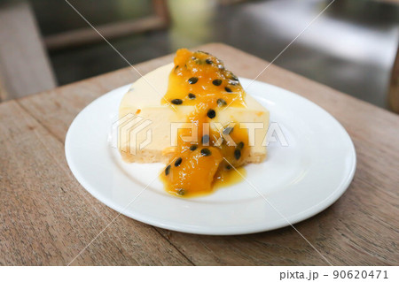 cheese cake ,cheese tart or cheese cake with passion fruit dressing topping 90620471