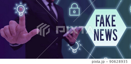 Conceptual display Fake News. Business showcase Giving information to showing that is not true by the media Businessman in suit holding open palm symbolizing successful teamwork. Conceptual display Fake News. Business showcase Giving information to showing that is not true by the media Businessman in suit holding open palm symbolizing successful teamwork. 90628935