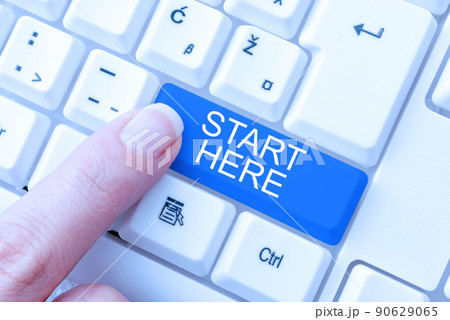 Hand writing sign Start Here. Business approach telling someone this is beginning point to go from to destination -48986 90629065