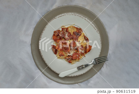 Truffle carbonara spaghetti with fried bacon and grated cheese in ceramic plate. 90631519