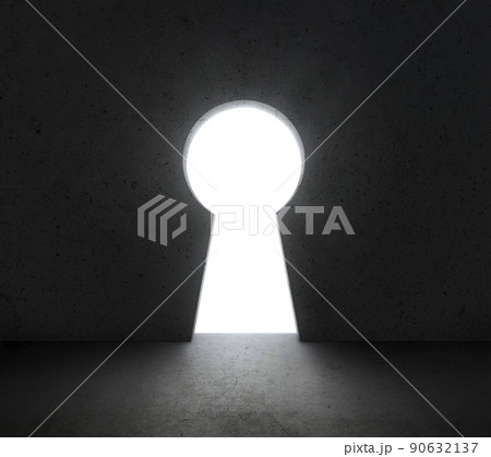 Front of bright big keyhole door, in a concrete wall 90632137