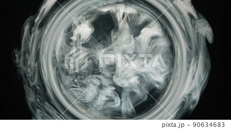 Ink water explosion. Fluid splash in circle. Logo reveal layer. White grey color smoke round cloud motion on dark black abstract art background shot on Red Cinema camera 6k. Ink water explosion. Fluid splash in circle. Logo reveal layer. White grey color smoke round cloud motion on dark black abstract art background shot on Red Cinema camera 6k. 90634683