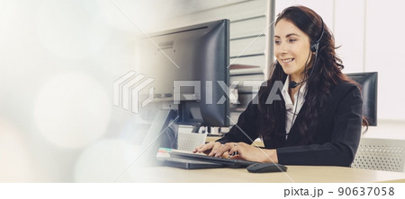 Business people wearing headset working in office broaden view 90637058