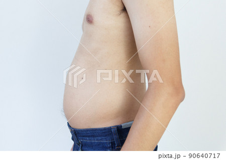 Close up of paunchy fat man, Fat man showing his belly Close up of paunchy fat man, Fat man showing his belly 90640717