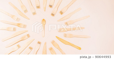 Banner eco friendly disposable kitchenware utensils on white background.Wooden forks,spoons,zero waste.Copy space.Eco friendly wooden cutlery.plastic free concept.Disposable wooden cutlery.Eco concept 90644993