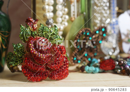 Vintage Rhinestone Rose Bracelet With Jewelry Box in Background Vintage Rhinestone Rose Bracelet With Jewelry Box in Background 90645283