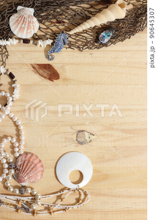 Fishing Net and Sea Shells on Wooden Background 90645307