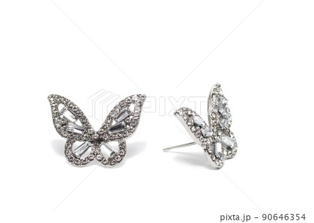 Earrings isolated on white background. Concept of fashion. Earrings isolated on white background. Concept of fashion. 90646354