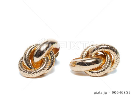 Earrings isolated on white background. Concept of fashion. Earrings isolated on white background. Concept of fashion. 90646355