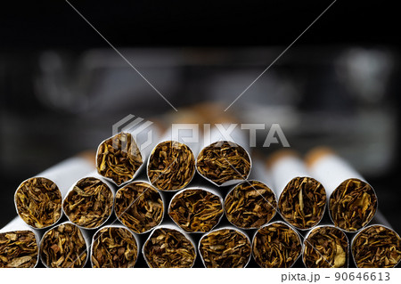 Close-up of Tobacco Cigarettes Background or texture. 90646613