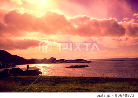 Beautiful blue seascape at sunset. Wild nature Norway. Nordkapp, Mageroya island Honningsvag Beautiful blue seascape at sunset. Wild nature Norway. Nordkapp, Mageroya island Honningsvag 90648972