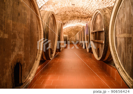Vintage winery cellar with wine wooden barrels 90656424