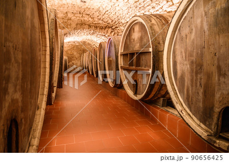 Vintage winery cellar with wine wooden barrels 90656425