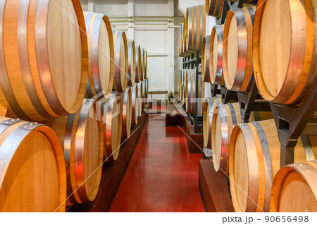 Vintage winery cellar with wine wooden barrels 90656498