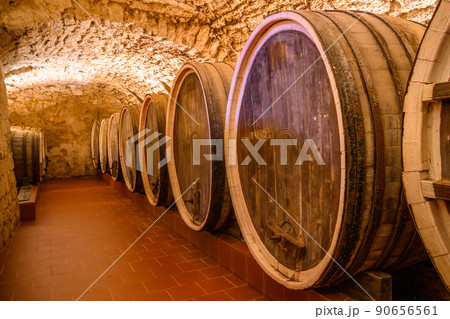 Vintage winery cellar with wine wooden barrels 90656561