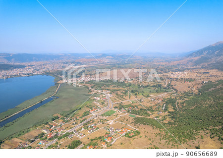 Lake, village, townhomes, forest in the mountain. Drone view, aerial view, top view 90656689