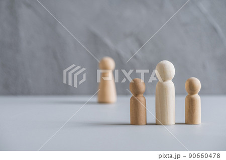ingle father with two children. wife behind them. Divorce and breaking of relations. Concept made from wooden men people ingle father with two children. wife behind them. Divorce and breaking of relations. Concept made from wooden men people 90660478