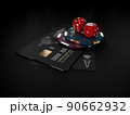 3d Rendering of casino gold chips and black play cards with bank card 90662932