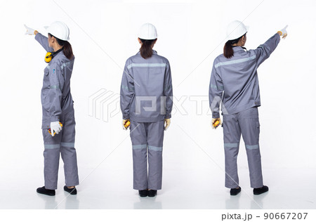Full length 20s young Asian Woman contractor engineer, pointing finger up in Air 90667207
