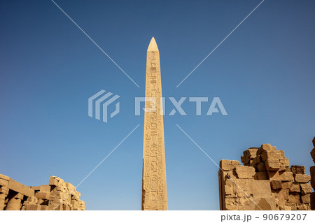 Different hieroglyphs on the walls and columns in the Karnak temple. Karnak temple is the largest complex in ancient Egypt. Different hieroglyphs on the walls and columns in the Karnak temple. Karnak temple is the largest complex in ancient Egypt. 90679207