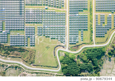 Solar farm, field or solar power plant in aerial view.  90679344