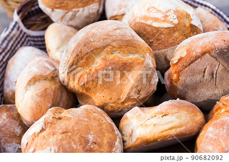 ruddy rolls of fresh warm grain bread 90682092