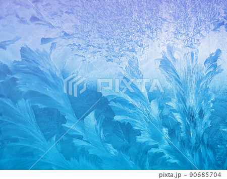 Beautiful ice pattern and sunlight on window 90685704