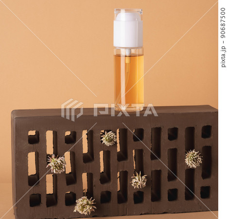 Liquid beauty product on a brick podium 90687500