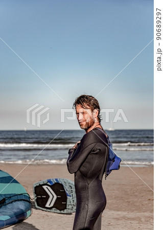 wing foil old kiter on the beach 90689297