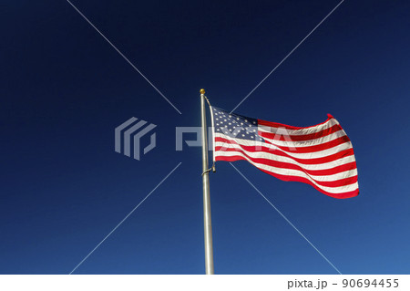 Close up shot of America flag swinging 90694455