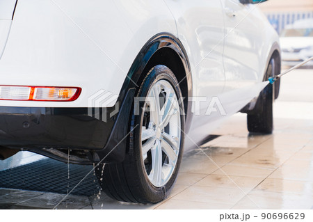 wet white car. self-service car wash. car washer. 90696629