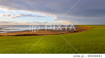 The beautiful landscape of Nordstrand Germany at the Wadden Sea The beautiful landscape of Nordstrand Germany at the Wadden Sea 90698881