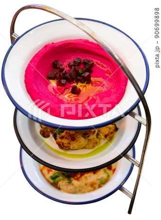 Three meze dishes served on rack 90699898