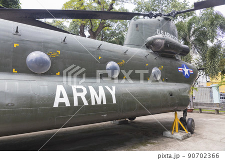 Ho Chi Minh, Vietnam - Oct 17, 2019 : Old tank and helicopter Chinookof United state army display at Vietnamese - American War Remnants Museum in Ho Chi Minh City, Vietnam on Oct 17, 2019. Ho Chi Minh, Vietnam - Oct 17, 2019 : Old tank and helicopter Chinookof United state army display at Vietnamese - American War Remnants Museum in Ho Chi Minh City, Vietnam on Oct 17, 2019. 90702366