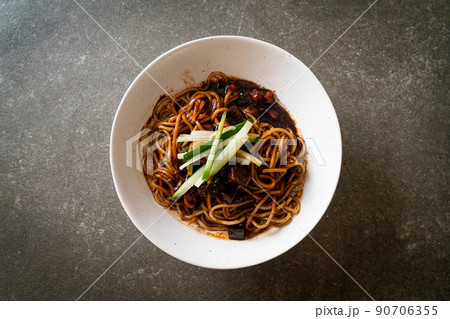 Jajangmyeon or JJajangmyeon is Korean Noodle with Black Sauce Jajangmyeon or JJajangmyeon is Korean Noodle with Black Sauce 90706355