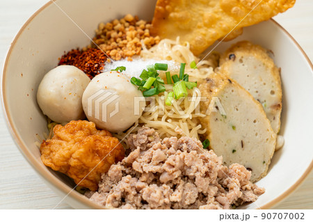 spicy egg noodles with fish balls and shrimp balls without soup spicy egg noodles with fish balls and shrimp balls without soup 90707002