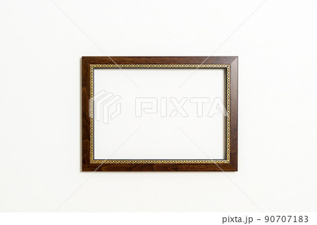 empty picture frame on white wall background empty picture frame on white wall background 90707183