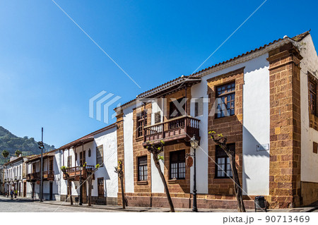 Teror at Gran Canaria, Spain. A beautiful traditional town with colorful houses with wooden balconies Teror at Gran Canaria, Spain. A beautiful traditional town with colorful houses with wooden balconies 90713469