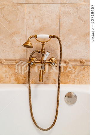 water tap and shower head in retro style. vintage interior. water tap and shower head in retro style. vintage interior. 90719467