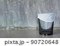 cement background with a bin 90720648
