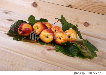 Nectarines on table 90722446