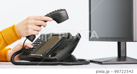 business. voip phone and monitor in the office close up 90722542