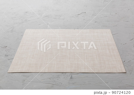 Perspective view of grey tablecloth for food on cement background. Empty space for your design Perspective view of grey tablecloth for food on cement background. Empty space for your design 90724120