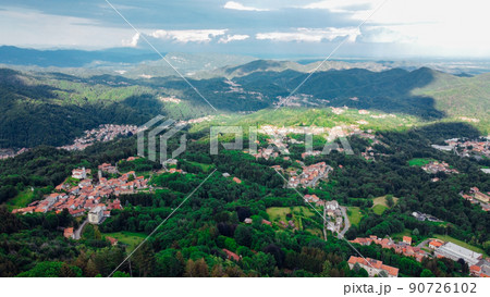 Aerial view of The Alpine foothills in Piedmont region. 90726102