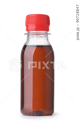Plastic bottle of caramel syrup 90728847