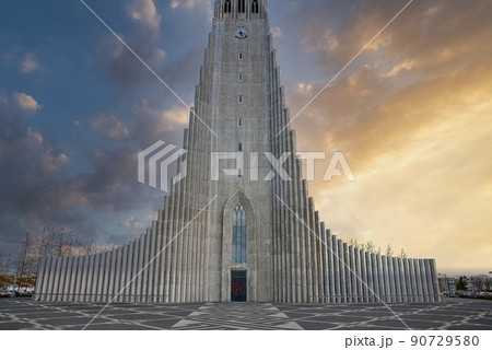 Majestic Hallgrimskirkja church in center of Reykjaivk against sky during sunset Majestic Hallgrimskirkja church in center of Reykjaivk against sky during sunset 90729580