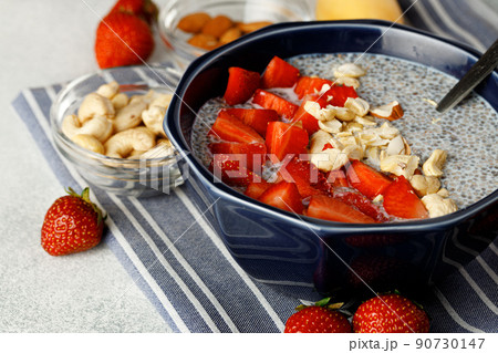 Bowl of chia pudding with fresh strawberries Bowl of chia pudding with fresh strawberries 90730147